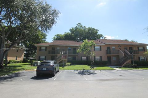 Photo of 721 NW 103rd Ter #202, Pembroke Pines, FL 33026 (MLS # A11863654)