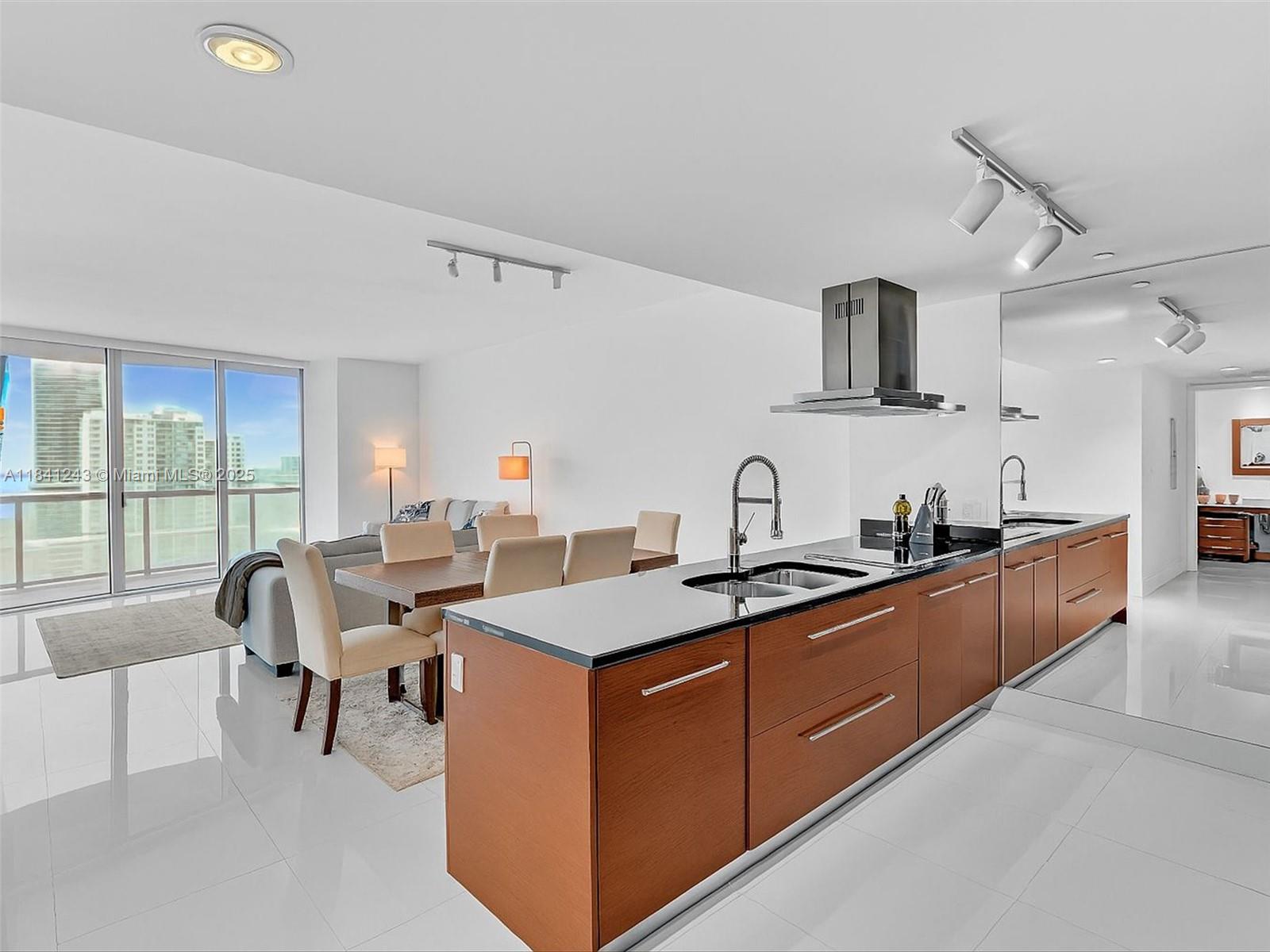 Step into serenity in the sky— this 1,035 sq. ft. 1BD/1BA south-facing home on the 50th floor offers direct water views, sunset vistas, and all-day light from southeast and southwest exposures. Enjoy peace at night, yet walk to Mary Brickell Village and all that Brickell and the Financial District offer. Features include Wolf & Sub-Zero appliances, New LG Washer/Dryer, blackout electric blinds in both rooms, 8.5 ft+ ceilings, ceramic floors, and an oversized balcony. Amenities: spa, steam room, sauna, jacuzzi, cold plunge, massive pool, large gym, and massage booking. HOA fee includes Cable, Internet, Water, Pest Control. The building has reserves and no assessments as of September 4 2025.