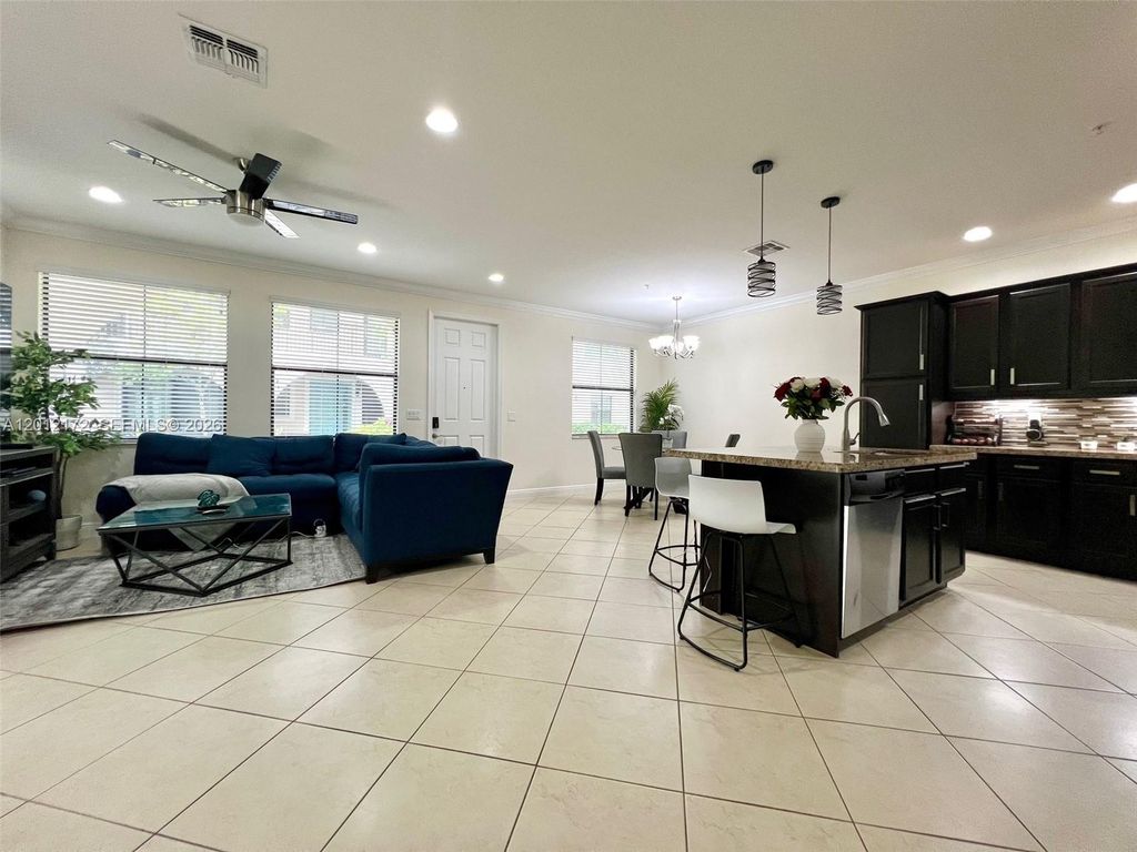 Photo of 3311 NW 125th Way, Sunrise, FL 33323 (MLS # A12012172)
