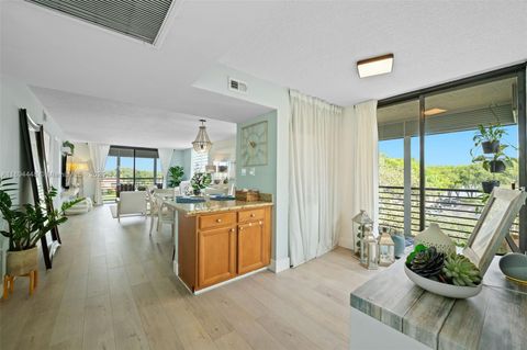 Photo of 900 Colony Point Cir #414, Pembroke Pines, FL 33026 (MLS # A11894448)