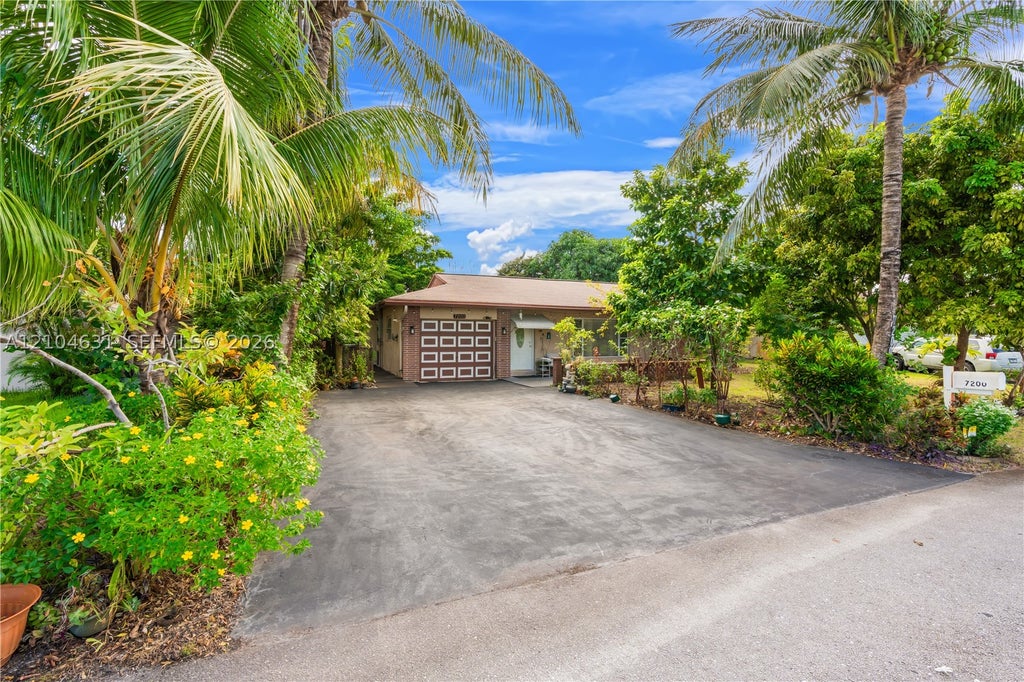 Photo of 7200 NW 92nd Ter, Tamarac, FL 33321 (MLS # A12104631)