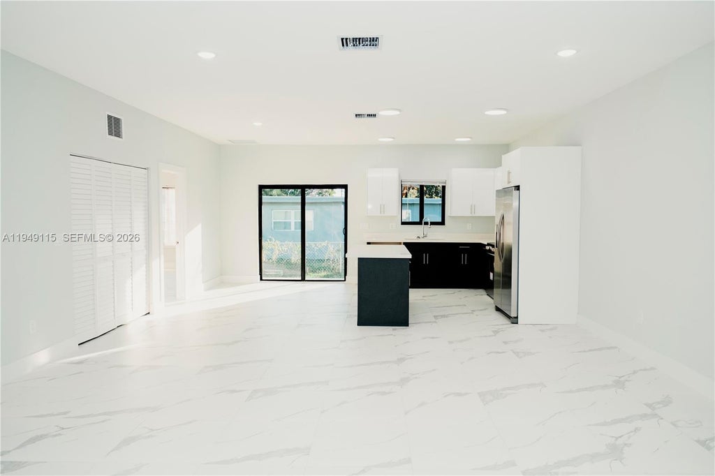 Photo of 820 NW 18th Ave, Pompano Beach, FL 33069 (MLS # A11949115)