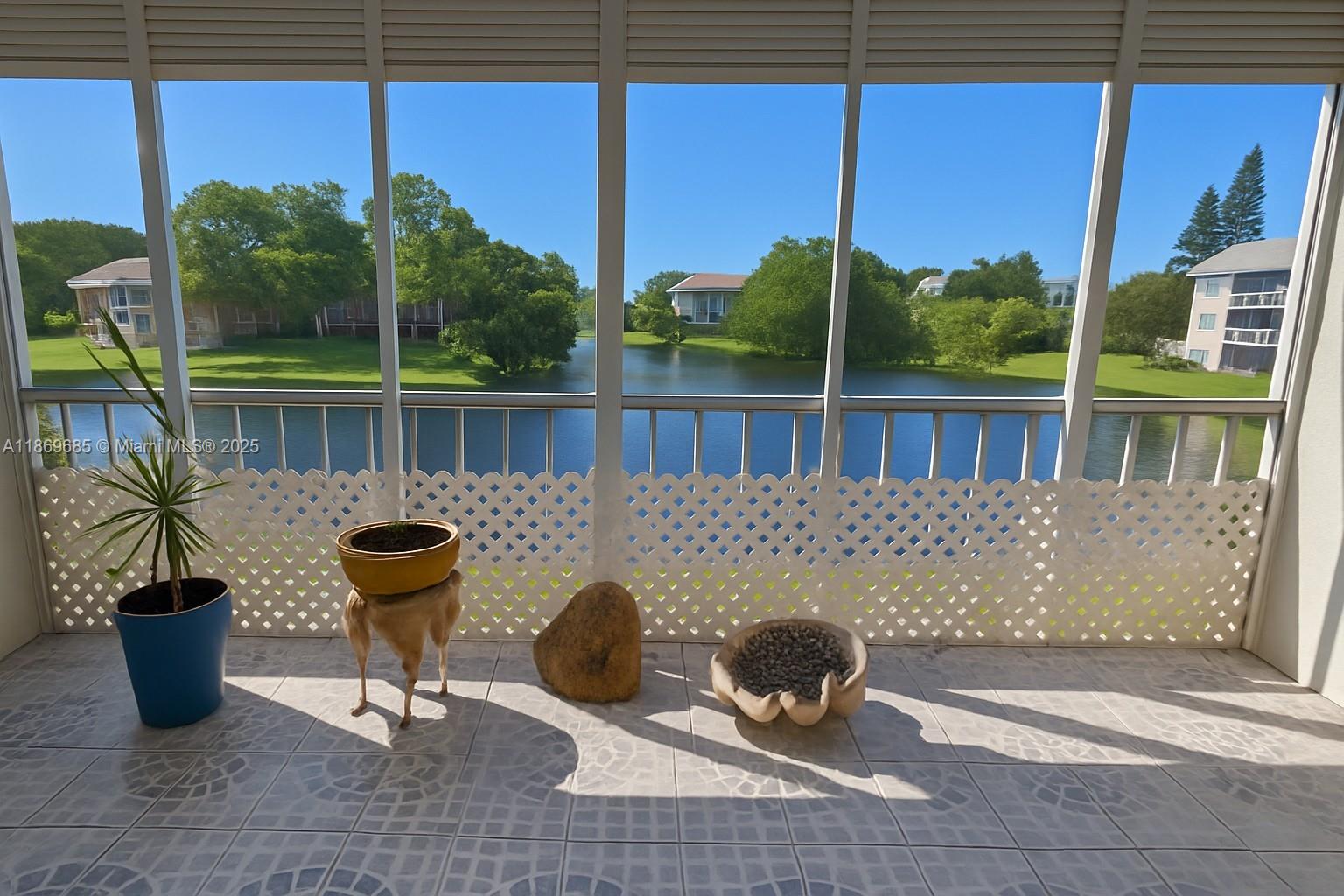Nestled on the second floor of sought-after Lake Forest Condominiums, this bright and inviting 2-bedroom, 2-bathroom unit offers a perfect blend of comfort and convenience. Each bedroom enjoys its own full bathroom-ideal for privacy and guest-ready living. Step through sliding glass doors onto the screened balcony with tranquil lake views—a calming backdrop for morning coffee or evening relaxation. The community features elevator access, refreshing pool, community room, and a fishing pier, all maintained by a reasonable HOA 475.00 monthly. Living here offers not just a home, but a vibrant Coral Springs lifestyle: enjoy waterfront serenity, easy elevator entry, and community perks—all within walking distance to Forest Hills Elementary, convenient shopping, dining, and major roadways
