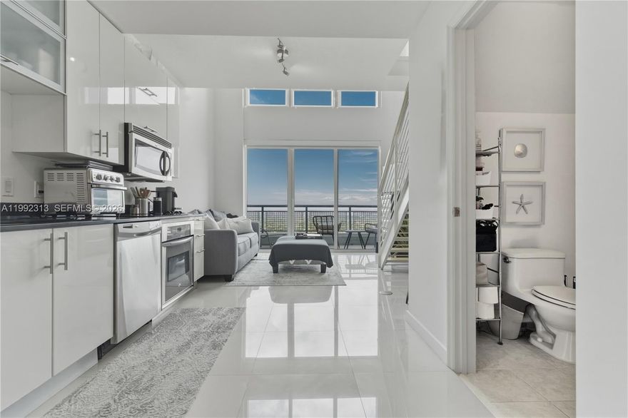 Modern 1/1.5 LOFT in the center of Brickell. Enjoy luxury living with a swimming pool, fully equipped gym, business center, stylish lounge, valet parking, and more. This amazing two-level unit features porcelain floors, stainless steel appliances, washer and dryer, and a private balcony with stunning bay, city, and sunset views. Cable, internet are included. Pet-friendly and packed with upscale amenities, this loft offers the ultimate urban lifestyle!
Per tax records, living area is 663 sq ft; however, an inspection report from the last purchase reflects approximately 739 sq ft. Buyer to verify all measurements.