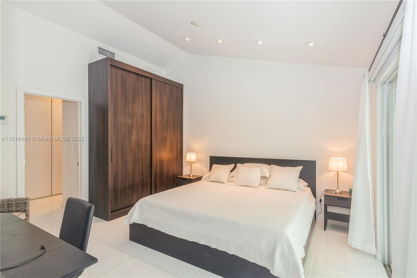 Welcome to 798 Crandon Blvd #55B, a beautifully remodeled 1-bedroom, 1-bath townhouse-style residence located in the heart of Key Biscayne's sought-after Le Phare community. This turnkey home has been thoughtfully upgraded with a sleek, modern design, offering a bright and open layout that maximizes space and comfort. Step inside to discover a stylish interior featuring contemporary finishes, updated flooring, a modern kitchen with clean lines and ample cabinetry, and a renovated bath with elegant fixtures. The two-level design provides separation between living and sleeping areas, creating a sense of privacy and flow. Enjoy lush, tropical landscaping right outside your door and easy access to Le Phare's peaceful walkways, pool, and pet-friendly community vibe.