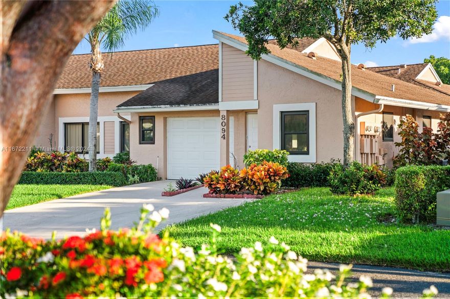 Move right into this fully renovated 2-bedroom, 2-bathroom villa with a 1-car garage, a true gem designed for comfort and style. The home features a brand-new European-style kitchen with newer stainless steel appliances, perfect for any gourmet chef. Impact windows provide peace of mind, and the corner unit layout offers maximum natural light and a cozy den for added space. The primary suite boasts built-in closets, dual sinks, a separate dressing area, a walk-in shower. Not to be missed is the convenient laundry room with storage. Community offers resort-style living with 11 lakes, tennis, handball, pickleball, an active clubhouse, gym, and more. Best of all, water, cable, and internet are included, providing a resort lifestyle without the fees. Don't miss this beautifully appointed villa