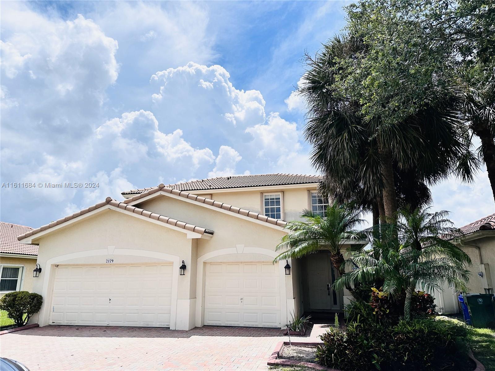 Beautiful and spacious 4-bedroom + den, living room, 2.5 bathrooms and 3-car garage house located in the Walnut Creek Gated community of Pembroke Pines. This immaculate two-story residence features vaulted ceilings and a brand new open kitchen with modern appliances. Enjoy the comfort of tiled and laminate floors, freshly painted interiors and exteriors, and a spacious master bedroom with a large walk-in closet and bathroom. Additional amenities include an internal laundry room with a washing machine and dryer, a backyard with a patio and a playground, as well as access to a magnificent clubhouse with a communal pool, gym, playground, tennis courts and 24-hour security. The rental price includes lawn care, which provides the perfect combination of comfort, convenience and luxury living.