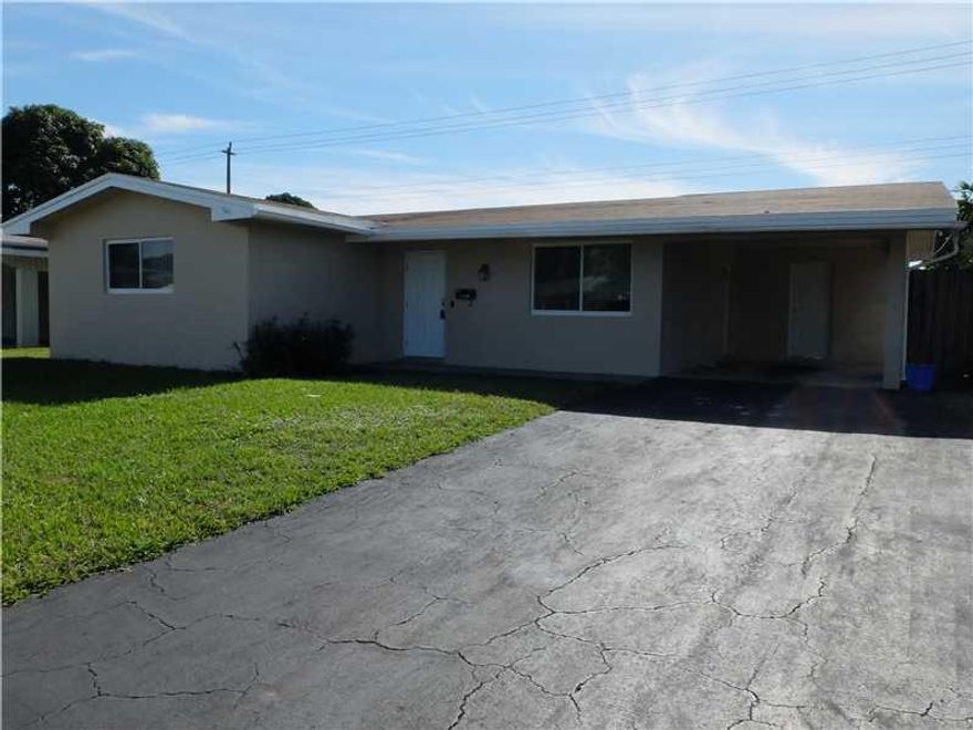 This Remodeled Pines Beauty has lots of room to expand. comes with plans for 3 bedroom converson or enjoy home as is with Remodeled kitchen and bathroom Impact windows throughout
