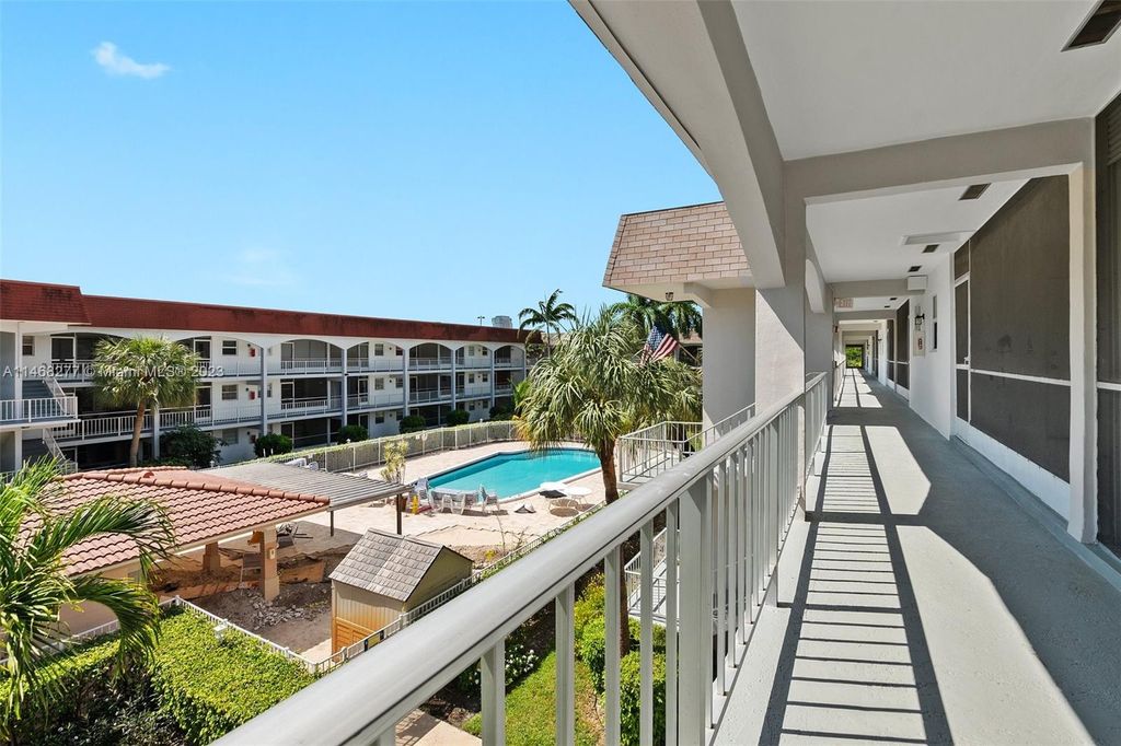 Photo of 581 Blue Heron Dr #318-B, Hallandale Beach, FL 33009 (MLS # A11468277)