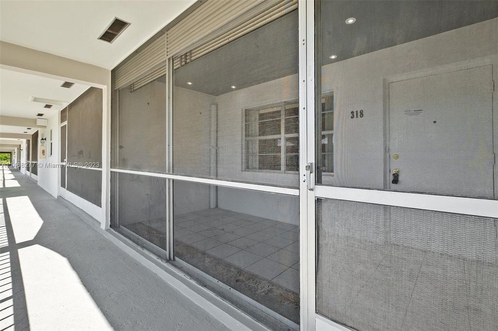 Photo of 581 Blue Heron Dr #318-B, Hallandale Beach, FL 33009 (MLS # A11468277)