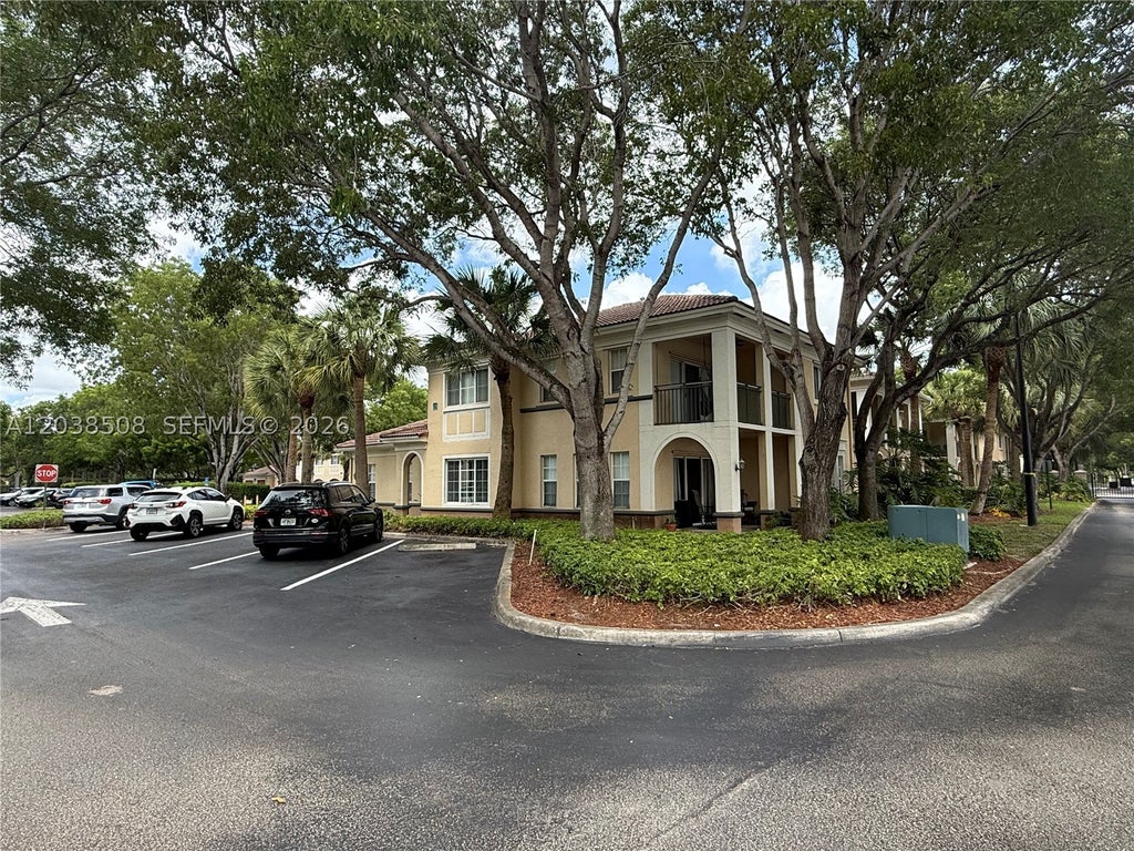 Photo of 2442 Centergate Dr #206, Miramar, FL 33025 (MLS # A12038508)