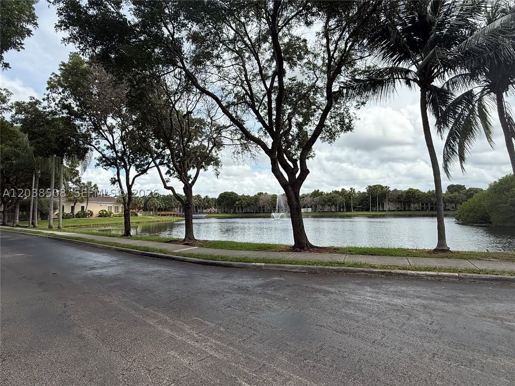 Photo of 2442 Centergate Dr #206, Miramar, FL 33025 (MLS # A12038508)