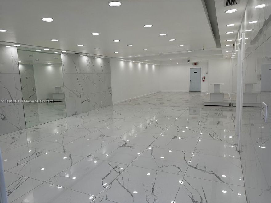 Gorgeous open space for Retail, Office or studio. Large Space with lots of natural light, beautiful outdoor space with turf and gated for privacy. Large custom wall mirror, marble tile and 1 bathroom. A must see! Conveniently located in the heart of Hollywood. Lots of car traffic. Easy to Show. There is large studio behind that can also be rented if more space is needed.