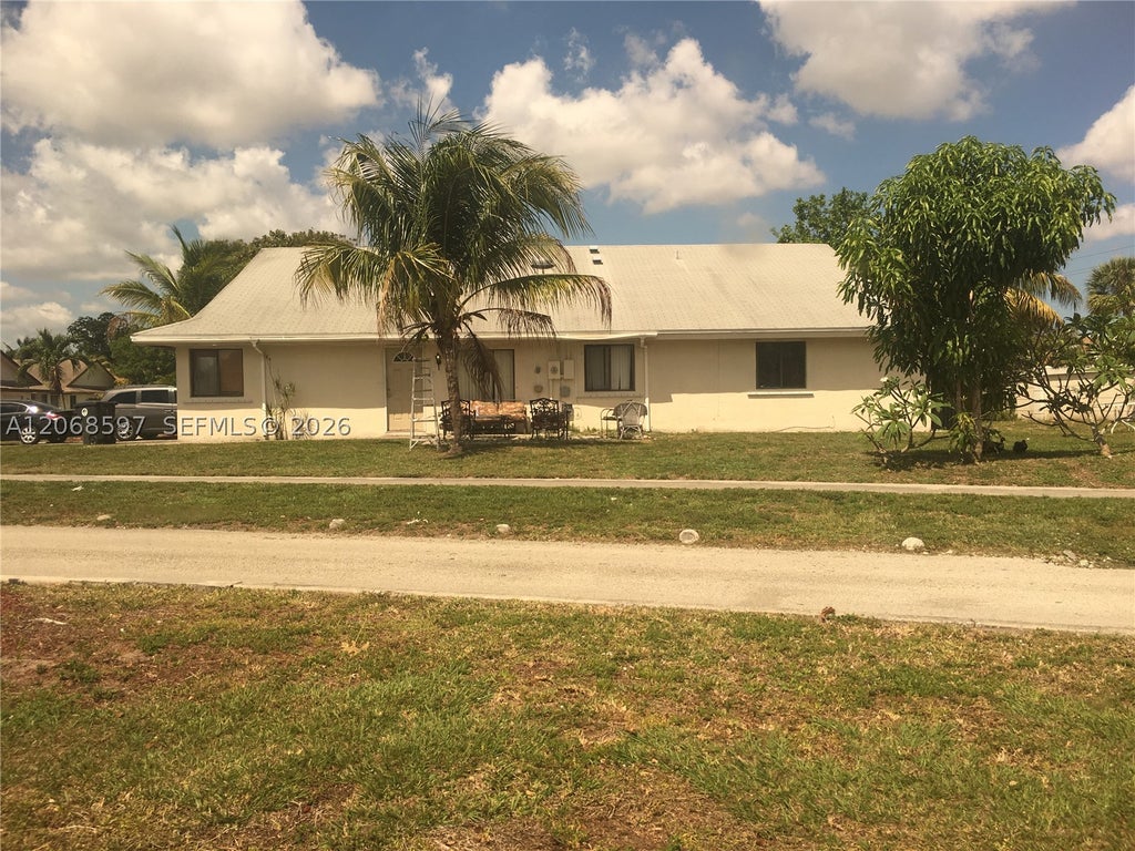 Photo of 6501 Harbour Rd #Front, North Lauderdale, FL 33068 (MLS # A12068597)