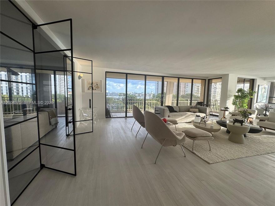 Beautifully Remodeled corner residence in the Renowned Jockey Club III. Located in a prestigious gated waterfront community, this spacious 3-bedroom, 2.5 bath residence offers 2,749 sq. ft of elegant living space. Enjoy breathtaking Bay views from the wrap-around terrace and floor-to-ceiling windows that fill every room with natural light. Unit features a modern kitchen with granite countertops, stainless steel appliances, and laundry room. Perfect for entertaining, it offers both formal and informal dining areas and an expansive primary suite with a huge walk-in closet. Enjoy resort-style amenities, including 24/7 security, heated pool, Jacuzzi, fully equipped gym with steam and sauna rooms, and complimentary valet and extra storage are included.