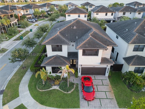 Photo of 8824 NW 161st Ter, Miami Lakes, FL 33018 (MLS # A12077626)