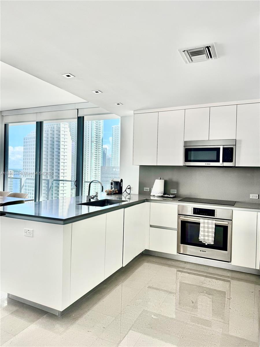 REACH CONDO - Residential Lease