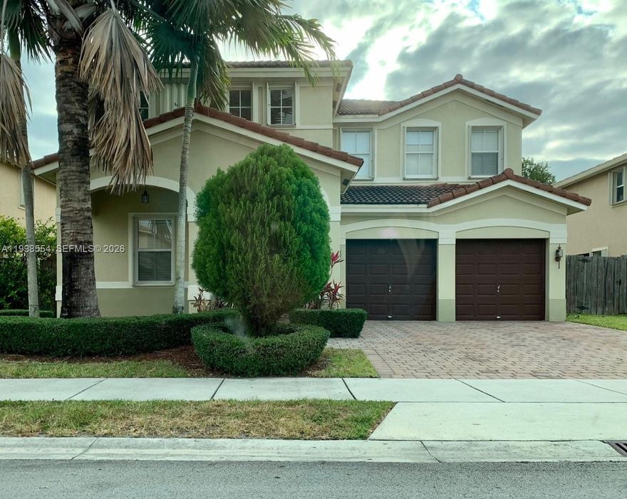Beautiful two story home with 3600 sq ft and dramatic spiral staircase for a Wow effect right away. The Large kitchen and pantry is amazing!  Big family room off kitchen area with counter, large bedrooms and three and a half bath. Newer construction and nice yard makes for a relaxing South Florida life for your family. Easy to show!