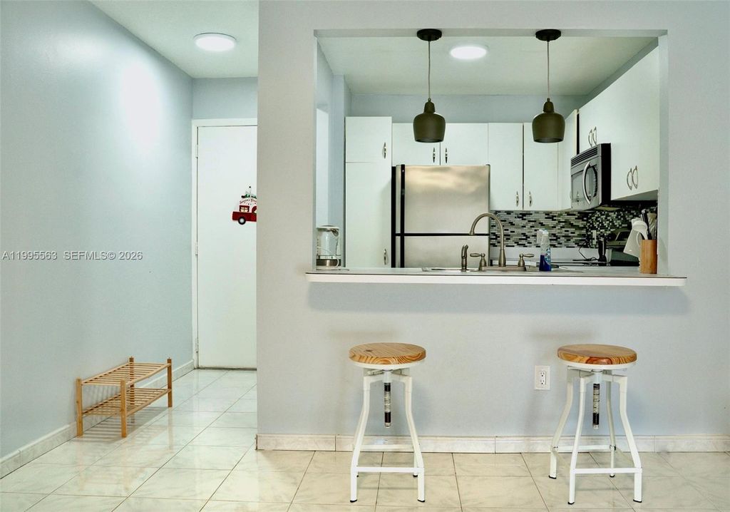 Photo of 430 SE 7th St #201E, Dania Beach, FL 33004 (MLS # A11995563)