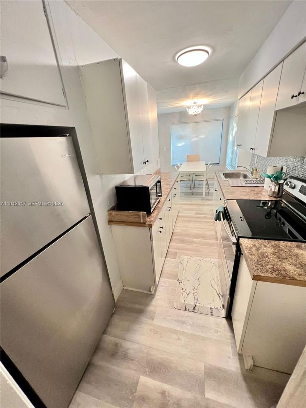 Photo of 1016 NE 17th Ave #5, Fort Lauderdale, FL 33304 (MLS # A11942347)