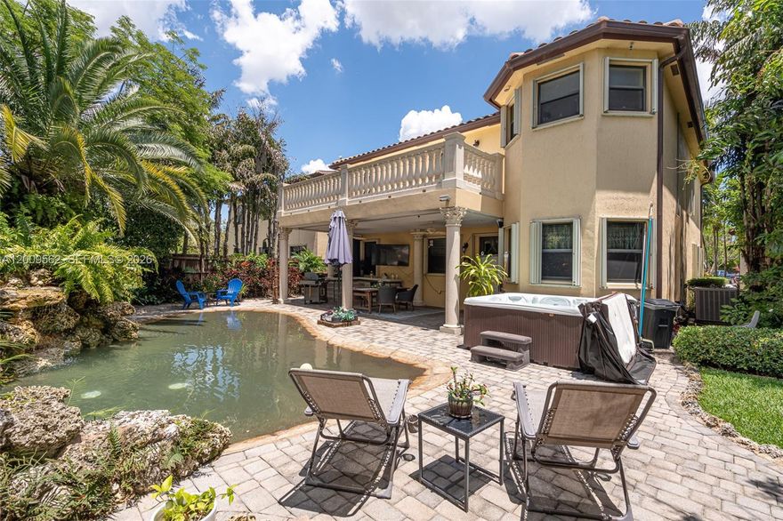 Thoughtfully designed and impeccably maintained, this exceptional home showcases premium finishes. Equipped with a comprehensive security system, new smoke alarm and cameras compatible with ADT,  a smart Google Nest Thermostat for energy-efficient climate control. Recent 2025 enhancements include a UV air purification light integrated into the A/C system, an eco-friendly upgraded sprinkler system, a brand-new well system, and amazing  patio, backyard lighting. South- and east-facing windows are fitted with heat-reducing sunscreen film, filling the home with natural light while maintaining comfort.
Inside, enjoy tile flooring throughout both levels, custom storage cabinetry in all three bathrooms, and an elegant oversized chandelier anchoring the dining space.
Step outside into your own private tropical oasis, mature palm landscaping, mango and avocado trees, and a resort-style pool with a stunning coral waterfall feature. A 6-person jacuzzi spa and newly installed screen curtains (February 2026) create the ultimate space for relaxation and entertaining.
A garage storage shelving system, a large backyard storage shed, and full hurricane shutter protection for peace of mind. Ideally located just minutes from the marina in Homestead, near Baptist Hospital, and surrounded by excellent dining, shopping, and the Florida Keys Outlet Marketplace. Zoned for highly rated schools at all levels.
This is a rare opportunity to own a move-in-ready. it is waiting for​​‌​​​​‌​‌​​​‌‌​​​‌‌‌​​‌​​‌‌​​​​ you!