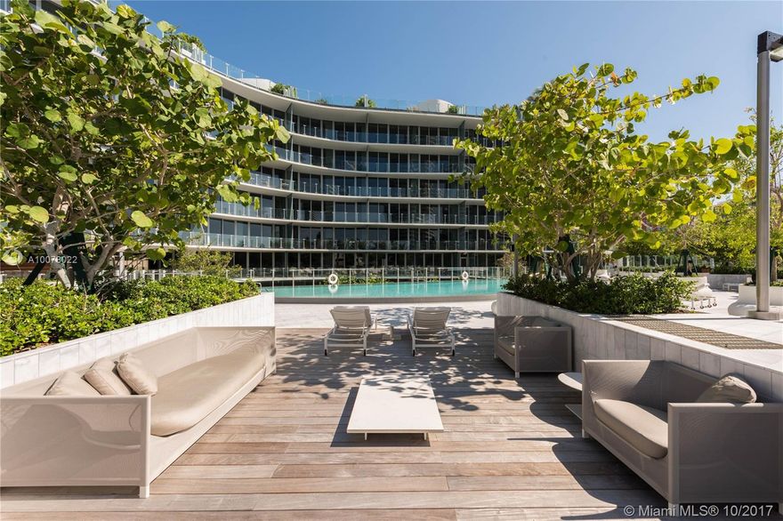 Best Unit South of 5th. Strikingly Beautiful Corner Residence w/ gracious wraparound terrace. Considered to be the most desirable line in the building, this never lived in residence has been masterfully redesigned to include an ultra-modern Chef's kitchen w/ ocean & downtown city views. Other enhancements include a grand master bedroom suite w/ beautiful view & walk in closet. This unit also comes w/ a private air conditioned 2 car garage. Easy to show.