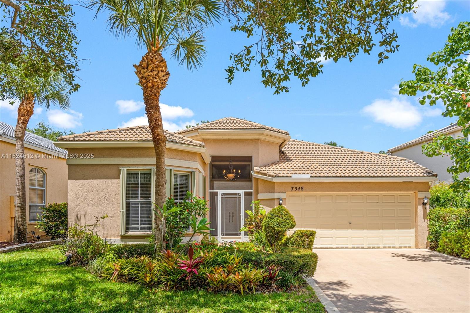 Welcome to this charming single-story home in a gated community with 24/7 security, offering privacy and peace of mind. The open floor plan includes an eat-in kitchen, a spacious primary bath with soaking tub, dual vanities, and a separate shower. Relax on the screened-in patio and enjoy the added features like accordion shutters and a two-car garage.Smith Farm offers a wealth of amenities, including a kiddie park, dog trails, and racquet courts — an ideal community for families! With a little TLC, this home has great potential to truly shine!