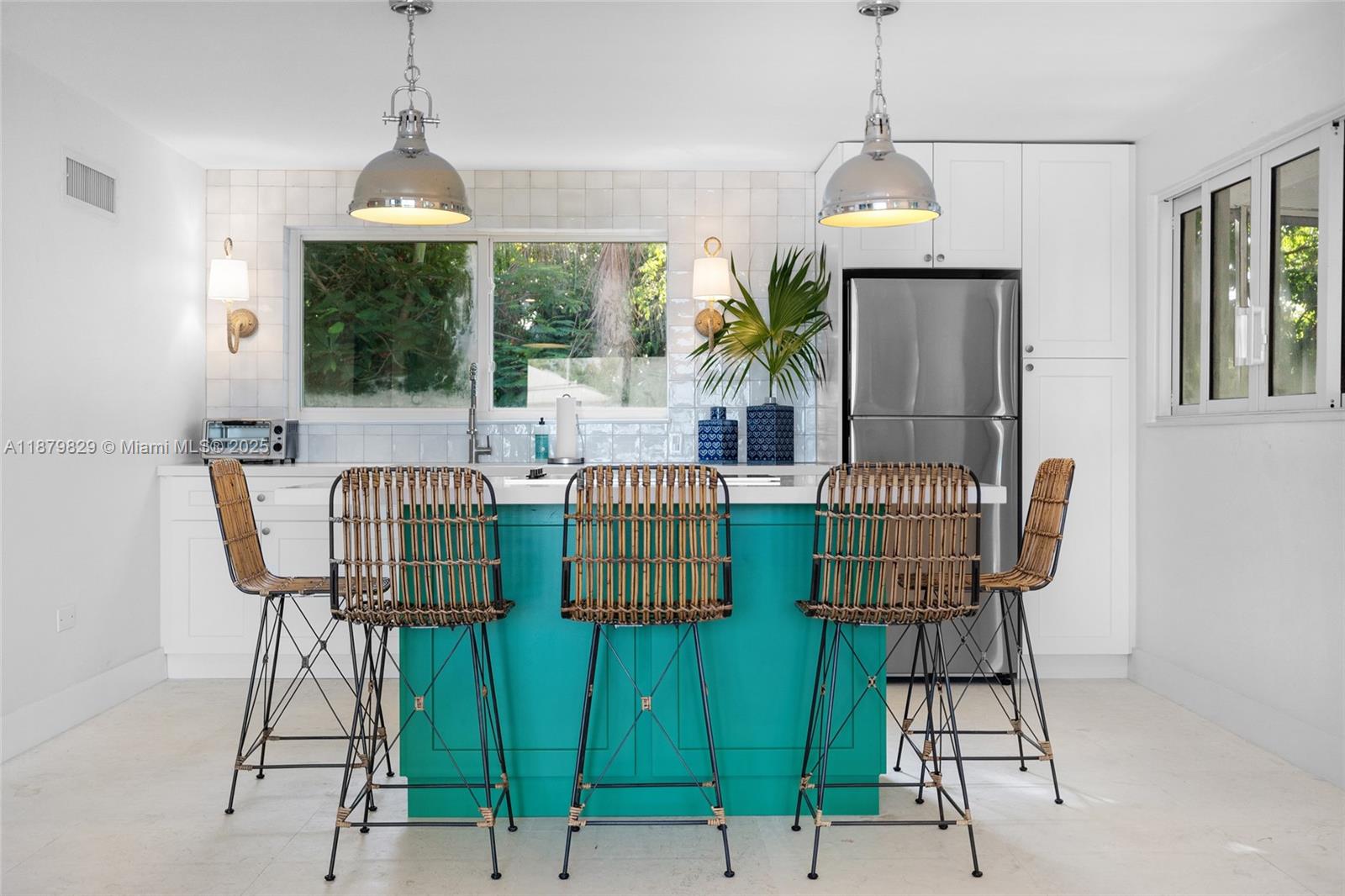 Wake up to island breezes in this fully furnished, professionally designed Tavernier retreat. Spend your mornings sipping coffee on the balcony, your afternoons exploring turquoise waters from the private boat ramp, and your evenings strolling to local seafood spots. Bright coastal decor, fully equipped kitchen, and plush bedding make it feel like home from day one. Perfect for travel professionals or anyone ready to blend work, play, and the laid-back Keys lifestyle.
