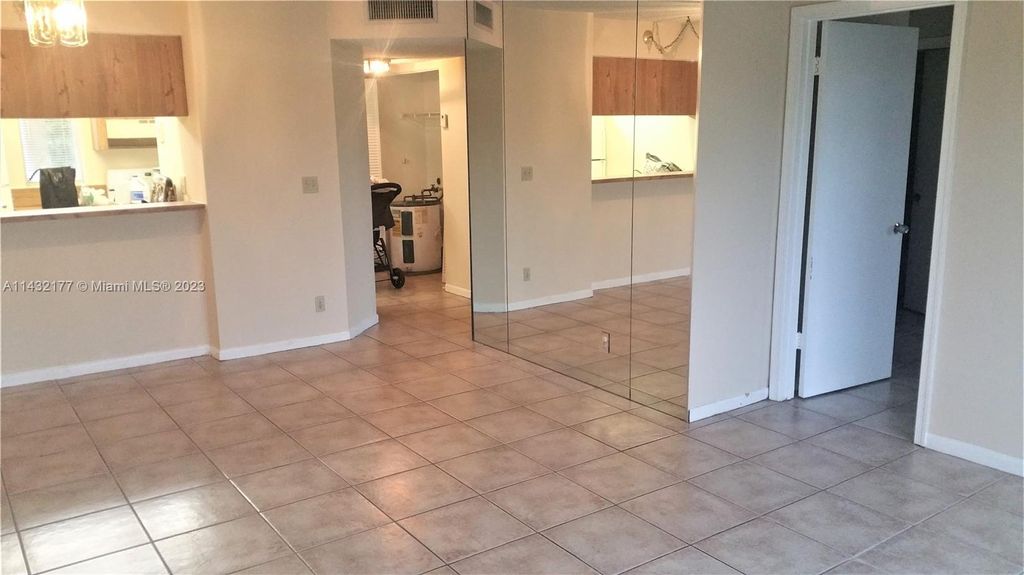 Photo of 9954 Twin Lakes Dr #7-O, Coral Springs, FL 33071 (MLS # A11432177)