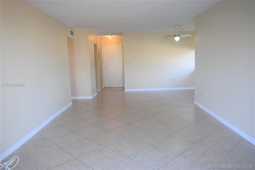 Beautiful 2/2 in sought after Village of the Falls. Tile floors throughout.  Lots of natural light in this spacious condo with large wrap around balcony overlooking the green area and tennis courts.  Washer and Dryer inside unit. Well kept building and common areas. Enjoy tropical living in the large pool patio area, Exercise room with electronic key and clubhouse. On sight management plus security guard at night. One assigned parking space right underneath the balcony and plenty of guest parking.  Enjoy nice quite sunsets from the balcony.  A must see!