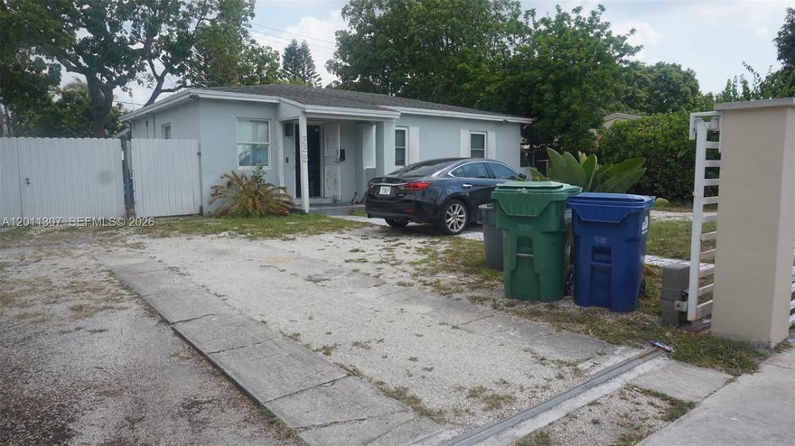 Updated 3/1 in highly sought after Miami Gardens... with plenty of parking and space for boat or RV. Features new ceramic floors in bedrooms, tile thru out rest of home... along with remodeled kitchen with Stainless Steel appliances and W/D. Plenty of potential and land to expand the home. Located close to highways, public transportation and less than 10 miles to the beach. Exterior features large backyard, with covered patio, fencing all around and plenty of fruit trees. Roof, A/C & water heater from 2017 and septic drain field replaced in 2025, also some windows and sliding door are hurricane impact. Currently tenant occupied with a month-to-month tenant, please do not disturb without a confirmed appointment, pet on premises. Please call listing agent for more information or to schedule a showing.