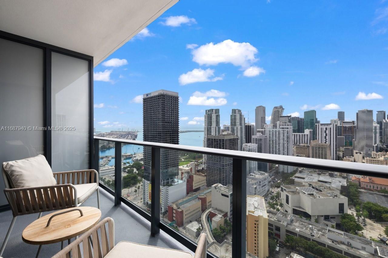 Experience elevated living in this sophisticated new studio, where comfort and luxury converge, and hotel-inspired amenities enhance your everyday. Currently rented!. Perfect for year-round living or as a flexible residence with potential rental income—enjoy it for as long or as short a stay as you desire. This apartment features top-quality finishes, smart home technology, high-impact windows framing stunning views, and a private balcony. Indulge in access to 70,000 sq. ft. of exceptional amenities, including a rooftop pool, bars, dining options, a fitness center, spa, and more. Ideally located just 2 minutes from Miami Worldcenter, Bayside, Kaseya Center, and renowned museums. It won't last long.