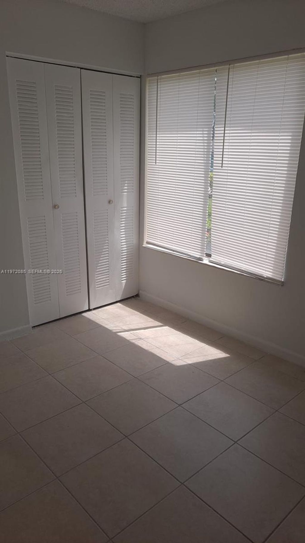 Photo of 2544 Riverside Dr #215, Coral Springs, FL 33065 (MLS # A11972085)