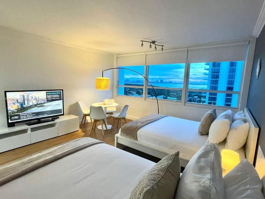 This stunning, one-of-a-kind studio offers breathtaking views from a high floor, making it a truly unique find. With no rental restrictions, it’s perfect for short-term rentals, a personal residence, or a second home that can generate income when you're not using it. The condo provides direct beach access, along with resort-style amenities including a pool, tennis court, on-site restaurants, valet parking, and more.