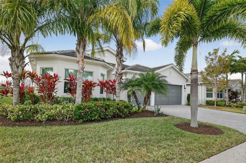 Photo of 11051 SW Ivory Springs Ln, Port St Lucie, FL 34987 (MLS # A11929975)