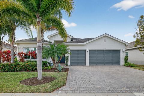 Photo of 11051 SW Ivory Springs Ln, Port St Lucie, FL 34987 (MLS # A11929975)