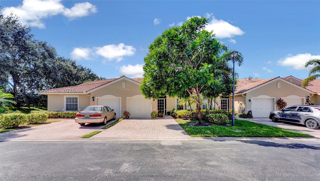 Photo of 2041 Stonington Ter, West Palm Beach, FL 33411 (MLS # A12107123)