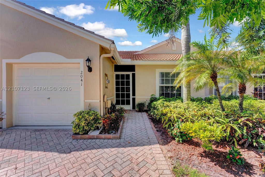 Photo of 2041 Stonington Ter, West Palm Beach, FL 33411 (MLS # A12107123)