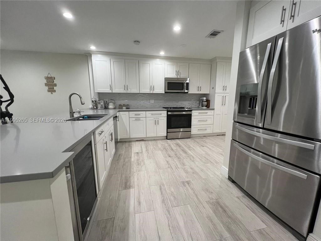 Photo of 307 Bonnie Brae Way #26, Hollywood, FL 33021 (MLS # A11995265)