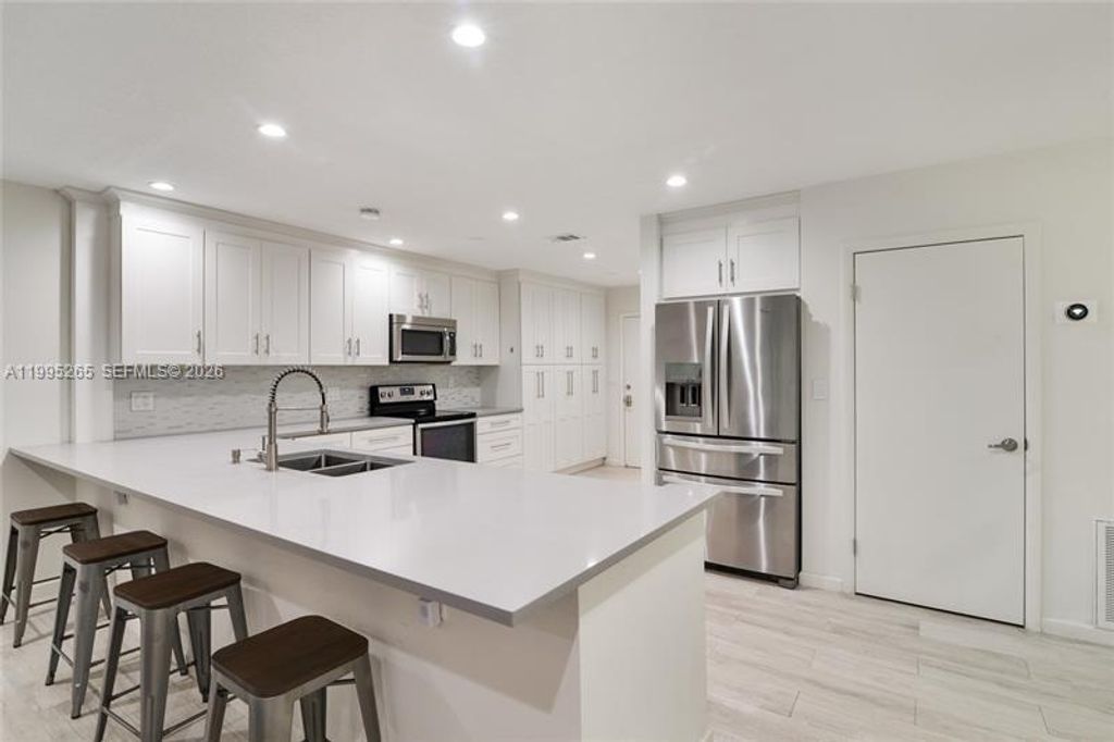 Photo of 307 Bonnie Brae Way #26, Hollywood, FL 33021 (MLS # A11995265)