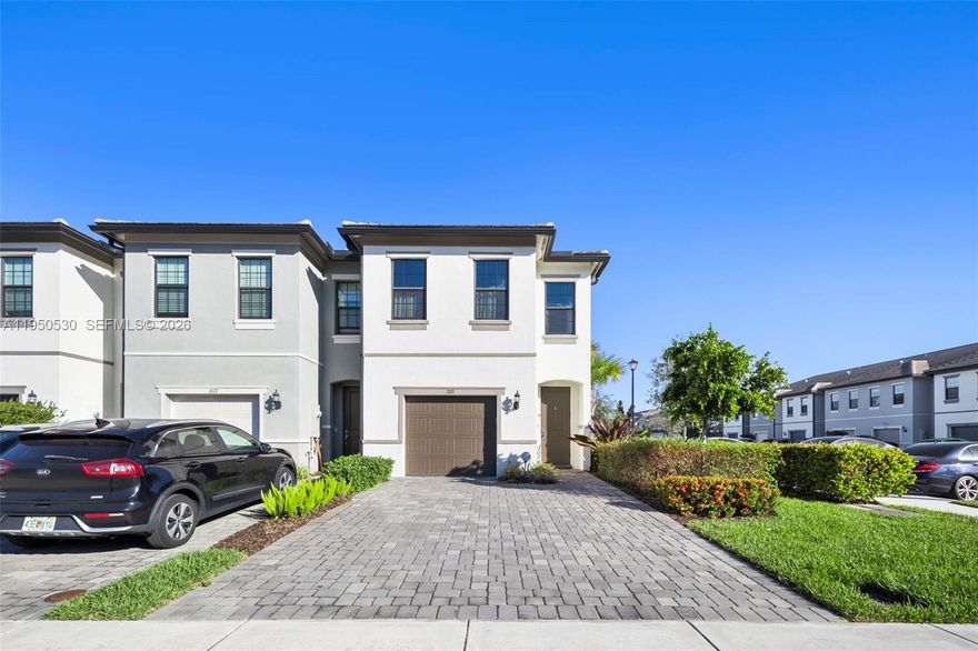 This stunning 3-bed, 2.5-bath corner townhome offers luxury living in a premier gated resort community. The home features an open-concept layout, a Chef’s kitchen, and a spacious master suite with a walk-in closet. High-end upgrades include a Tesla charger, smart home access, and a full Ring security system. Owners enjoy world-class amenities: a pool, clubhouse, pickleball courts, dog park, and workspaces. Perfectly located in Broward County, you are minutes from supermarkets, 6 miles from beaches, and 15 minutes from Las Olas Blvd. This modern, tech-ready home is the perfect blend of comfort and convenience.