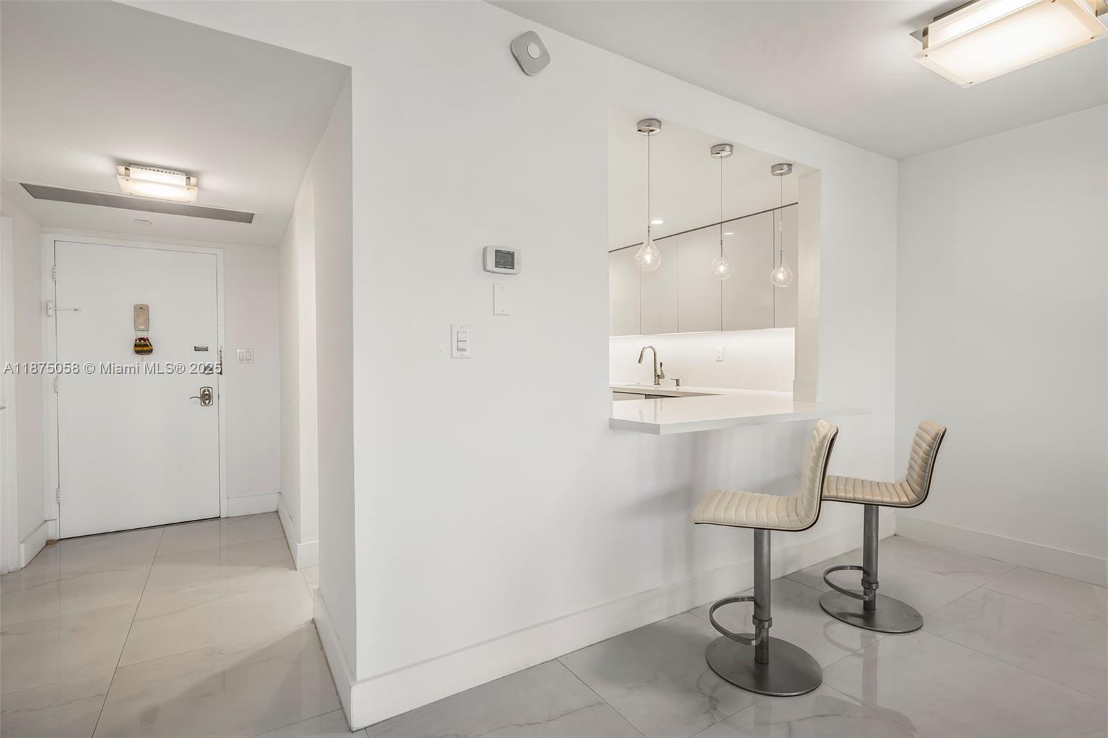 THE CARRIAGE HOUSE CONDO - Residential