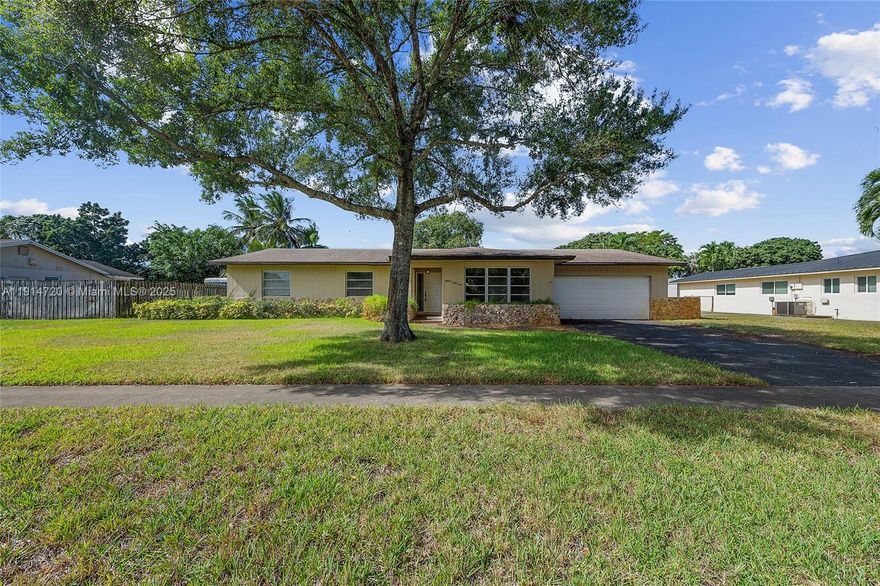 Bring your vision to life in Royal Palm South Estates. Nestled in the desirable Royal Palm South Estates, this 4-bedroom, 2-bath residence offers the perfect blend of comfort, location, & potential. Featuring a spacious layout, two-car garage, & a generous yard ideal for a future pool, this home presents a rare opportunity to live comfortably now while planning your dream renovation. Well-maintained and move-in ready, this home invites buyers with vision to customize and modernize to suit their personal style—all within a community known for its top-rated schools & family-friendly charm. Whether you’re envisioning a modern refresh or a complete transformation, this Royal Palm home is the canvas for your creativity. Bring your architect, designer, & contractor and imagine the possibilities.