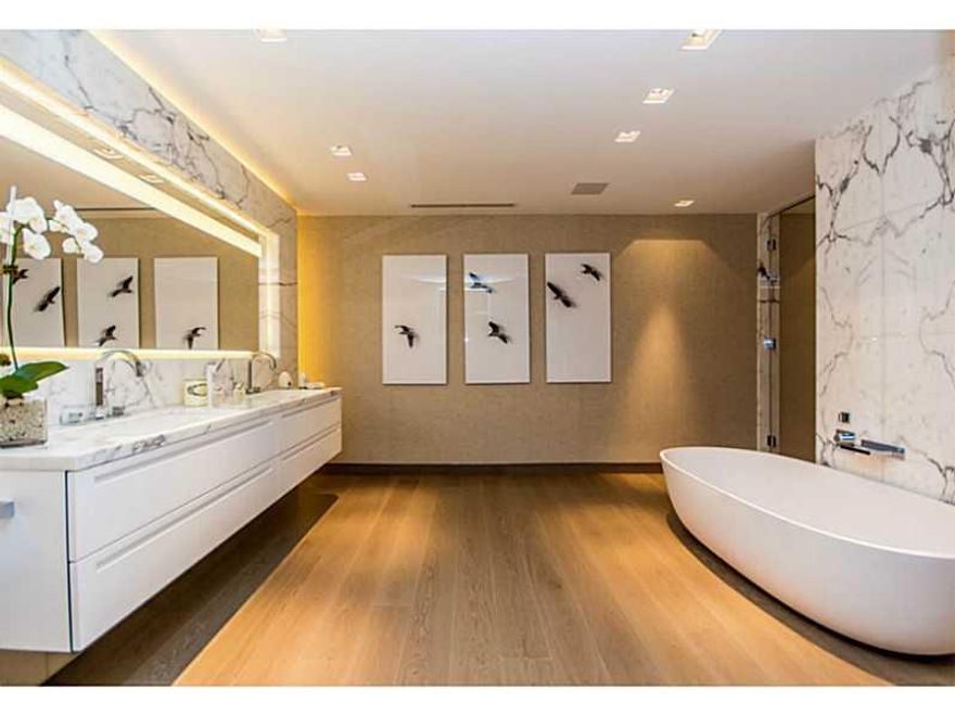 GREAT PRECONSTRUCTION VALUE IN EXCLUSIVE PALAZZO DEL SOL, FISHER ISLAND. Corner flow-thru unit w/expansive Wraparound Terraces & stunning Water and Miami Beach Views. This spacious A East floorplan features private elevator entry, 10' floor to ceiling gla ss, Boffi Kitchens w/ Gaggenau and SubZero appliances, luxurious Boffi Baths w/Book-Matched Statuaria Marble. Lualdi doors. Ultra-lux boutique tower will feature unmatched amenities, Enzo Enea gardens & 6-star white glove services. Completion Jan. 2016.