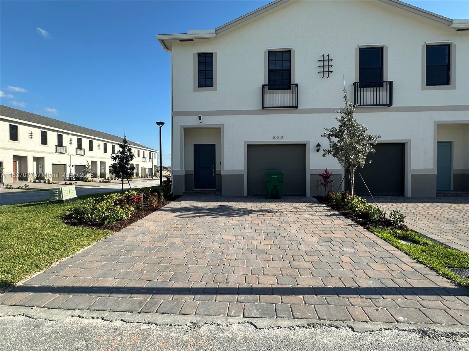 Welcome to your dream home in sunny Florida City! This newly constructed, modern 3-bedroom, 2.5-bathroom townhouse offers the perfect blend of comfort, security, and convenience—with 1,765 sq ft of thoughtfully designed living space and a 1-car garage. Step inside to discover an open-concept layout featuring sleek stainless steel appliances, elegant finishes, and a cutting-edge IQ Panel II smart home system that puts your entire home at your fingertips. Stay secure and connected with a video doorbell, Ring cameras throughout, and a motion-detecting security system. Section 8 welcome! ONLY TWO MONTHS MOVE IN!