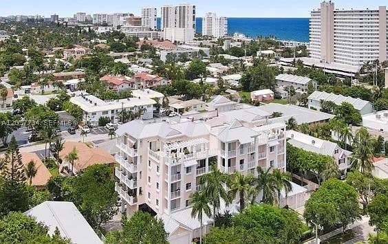 Photo of 1931 NE 2nd St #405, Deerfield Beach, FL 33441 (MLS # A12057794)
