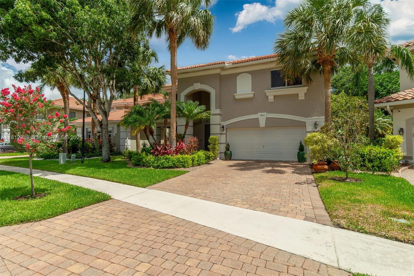 Beautiful home in a cozy gated community. Child, pet, and allergy friendly. Many upgrades and safety features. Sidewalks lead to nearby top-rated schools, and the community pool and playground are just steps away. Fenced-in patio. Central vacuum and hardwood floors allowed an otherwise highly allergic couple to own cats. Pet doors to garage and patio. Upgrades include a striking first floor bathroom, new appliances, elegant quartz countertops and backsplash, a new economical inverter a/c, a newer regular a/c, 8" crown molding, French doors dividing two open-concept living spaces, laundry room cabinets, built-in garage shelves, murals, and tropical fish-themed bathroom. Complete Brinks alarm system; fire and EMT station around the corner. Five minutes to Florida Turnpike and supermarkets.