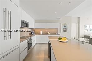 REACH CONDO - Residential Lease