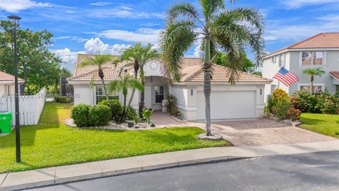 Photo of 1381 NW 129th Way, Sunrise, FL 33323 (MLS # A12103751)