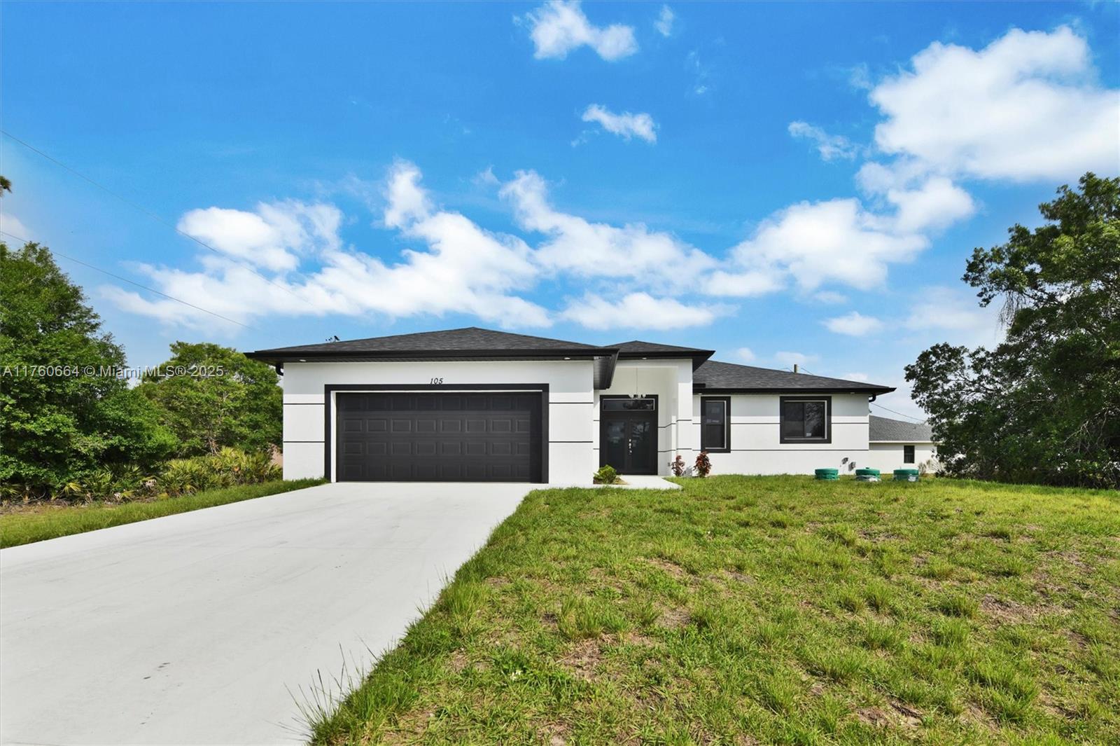 Property for Sale at 105 E 14th St, Lehigh Acres, Lee County, Florida - Bedrooms: 3 
Bathrooms: 2  - $349,900